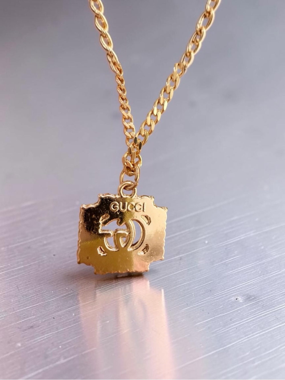 Rhinestone Gold Logo Pendant | 20"
Cuban Linked Gold Filled Necklace NEW - Picture 4 of 10
